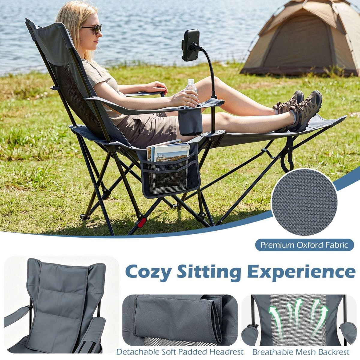 Grey reclining camping chair with extended footrest, padded headrest and mesh back