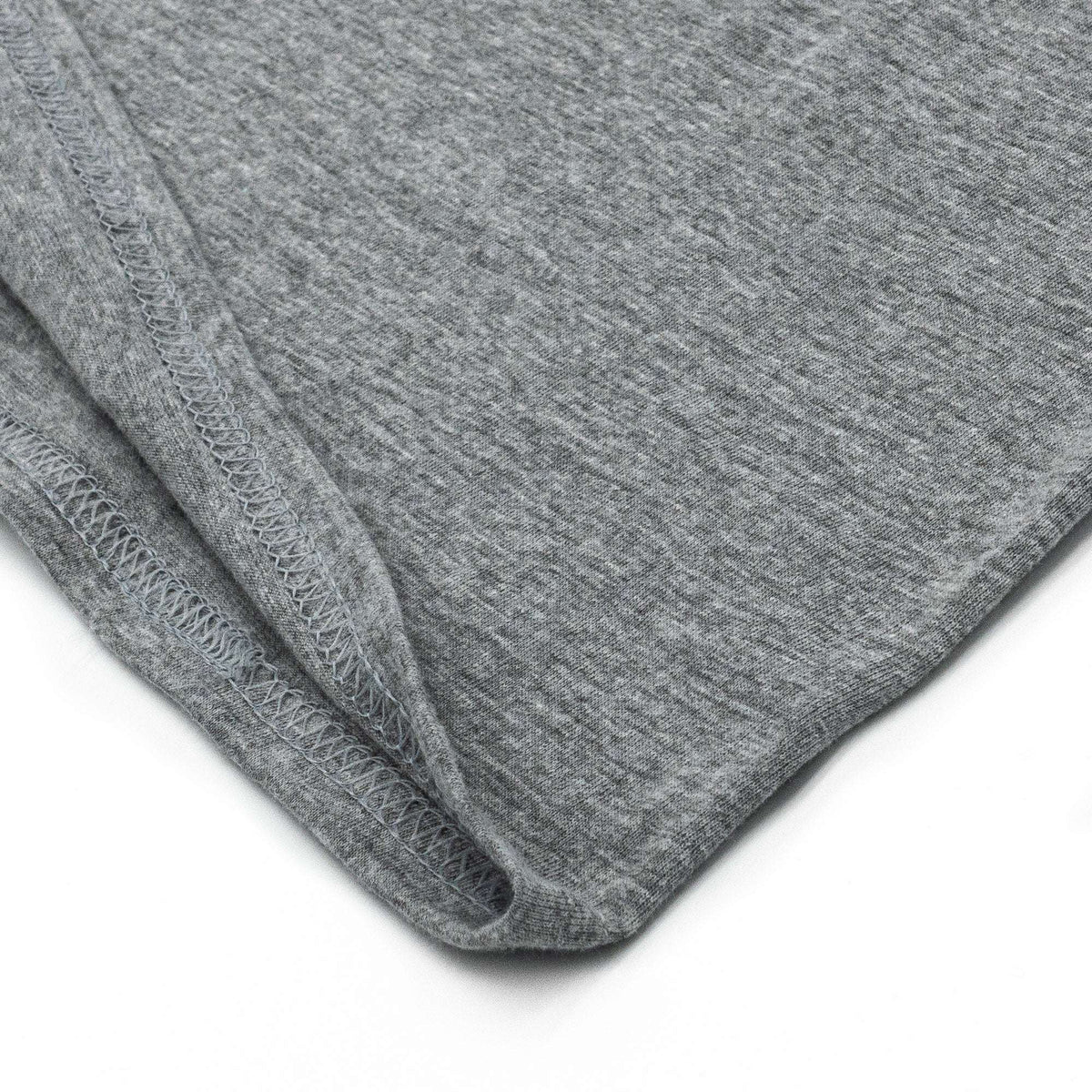 Gray T-shirt bottom hem with stitched edge detail