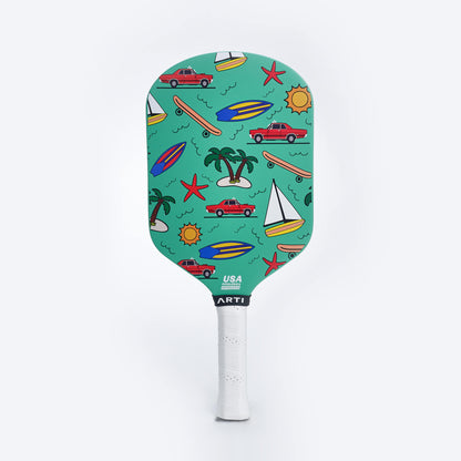 Mint pickleball paddle front view with tropical print face and white grip.