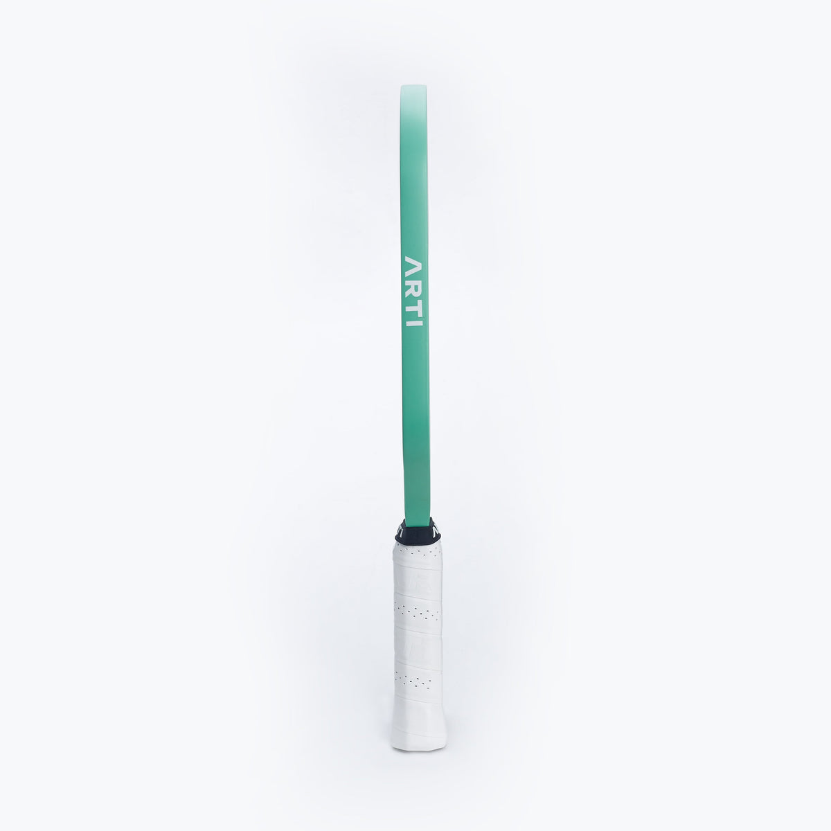 Side view of mint pickleball paddle with white grip and ARTI marking.