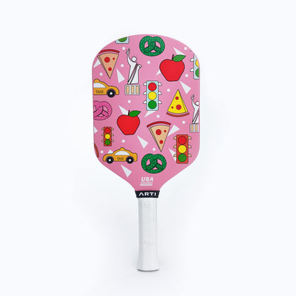 Pink pickleball paddle with colorful pattern, USA mark, and white grip