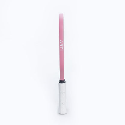 Pink pickleball paddle edge with ARTI text and white grip