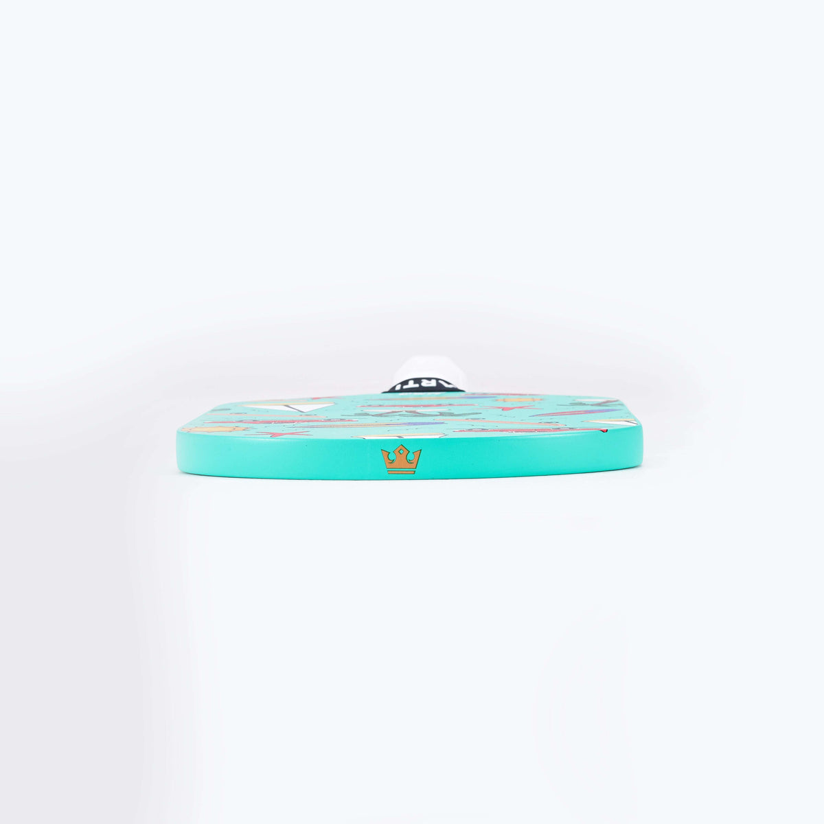 Mint pickleball paddle edge view with small crown logo on top.