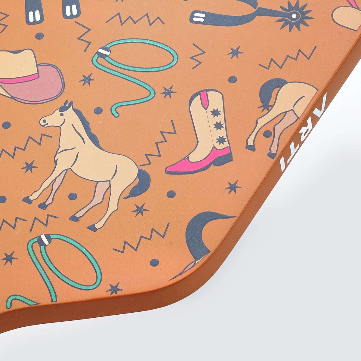 Orange paddle face with playful animal and star pattern in blue accents