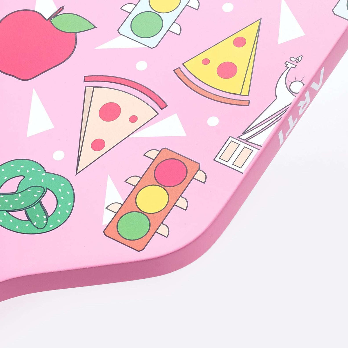 Pink pickleball paddle face with food-themed colorful graphics