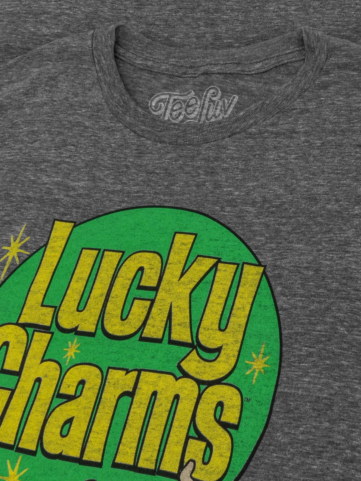 Heather gray T-shirt crew neck with Lucky Charms retro logo close-up