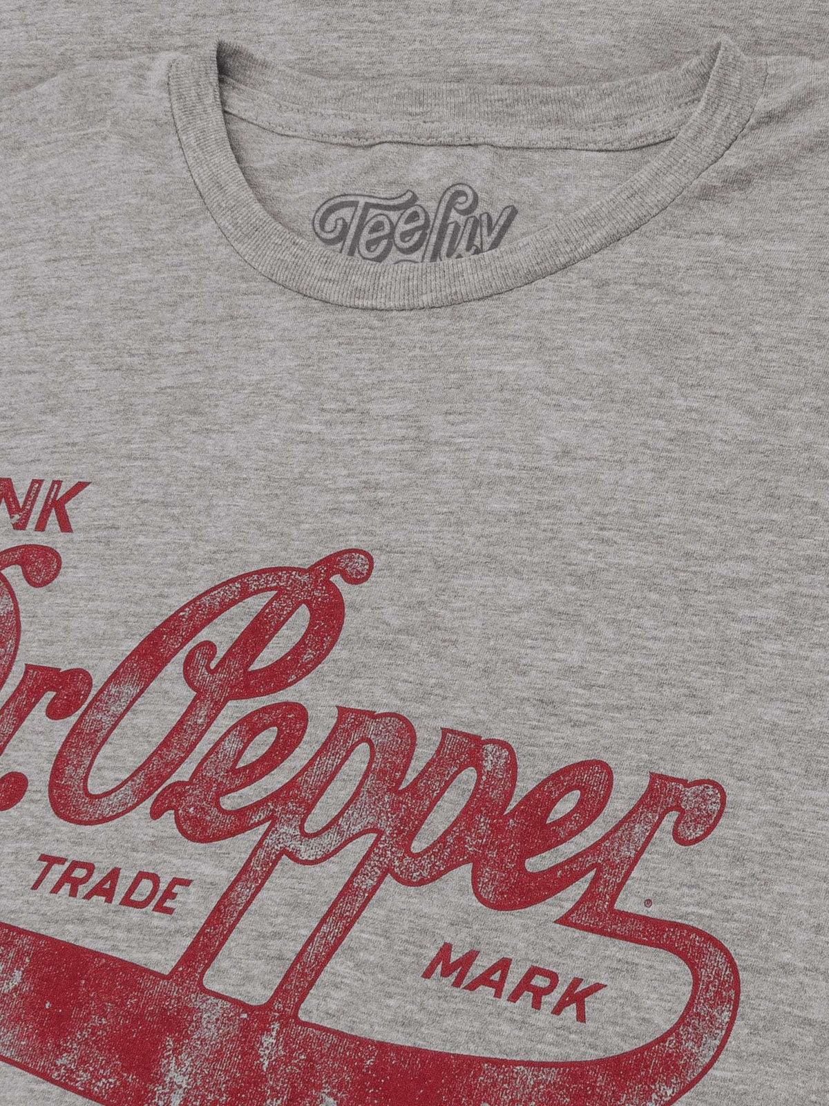 Gray T-shirt neckline with TeeLiv logo and crew collar trim