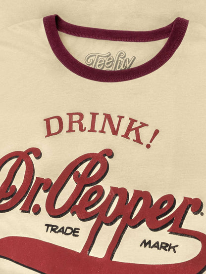 Beige ringer T-shirt close-up: maroon collar and Dr Pepper logo print