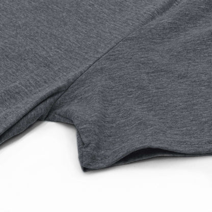 Gray t-shirt sleeve and hem detail, showing soft knit fabric.