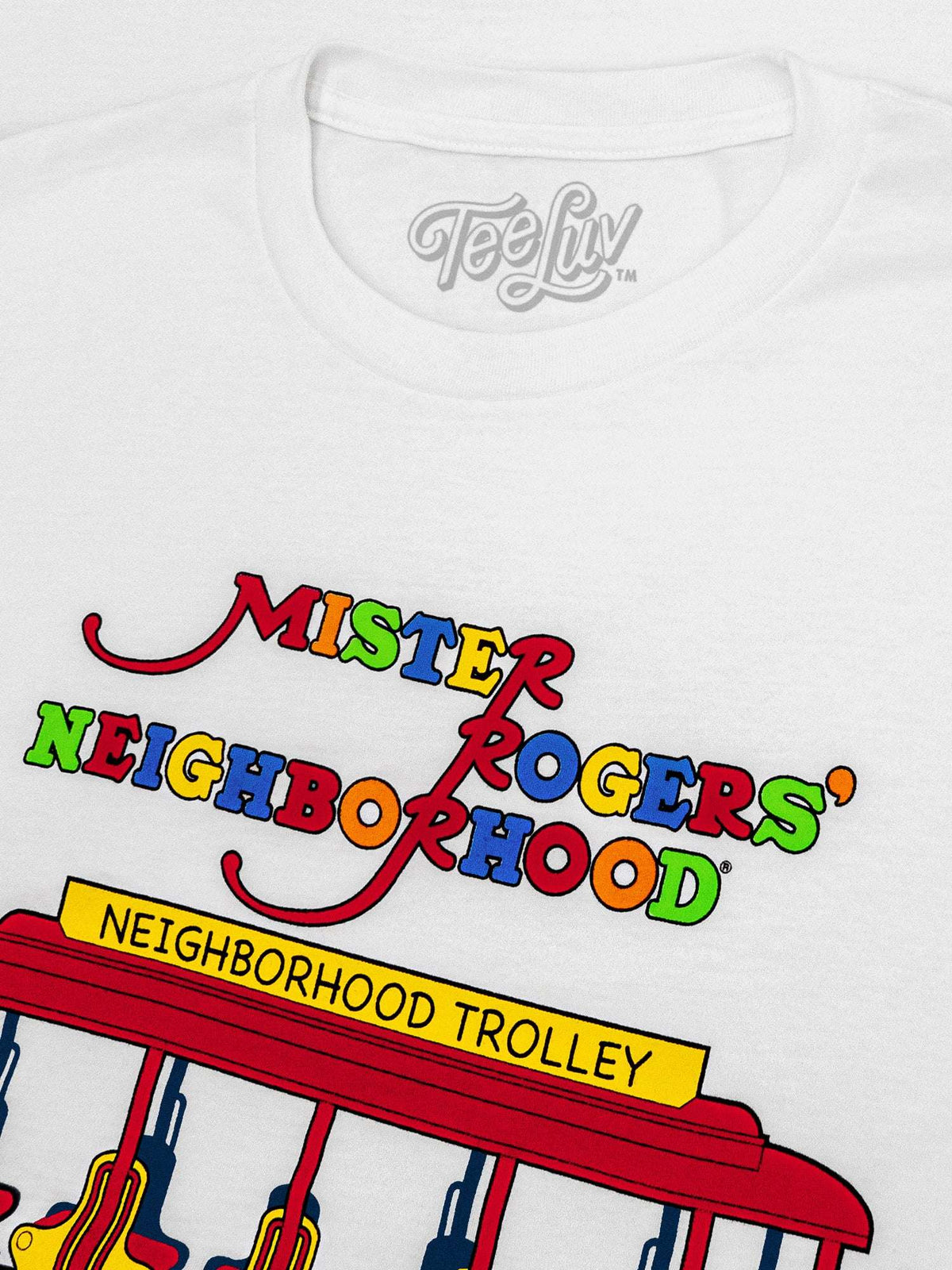 White T-shirt closeup: Mister Rogers' Neighborhood and Neighborhood Trolley front print
