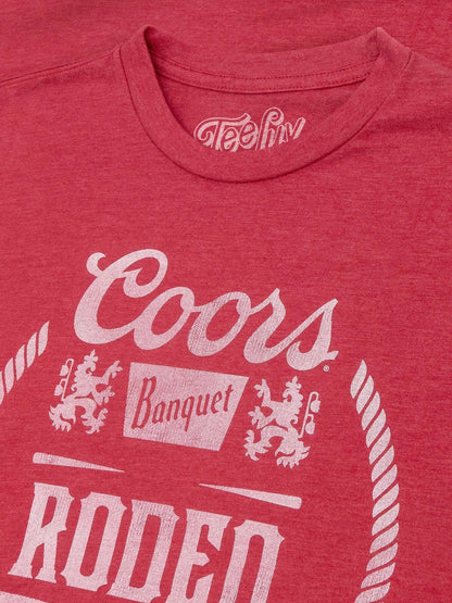 Red T-shirt close-up of front graphic, neckline, and white brand print