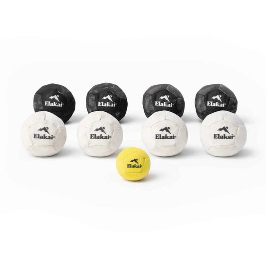 Indoor soft bocce set with four dark, four white bocce balls and a yellow pallino