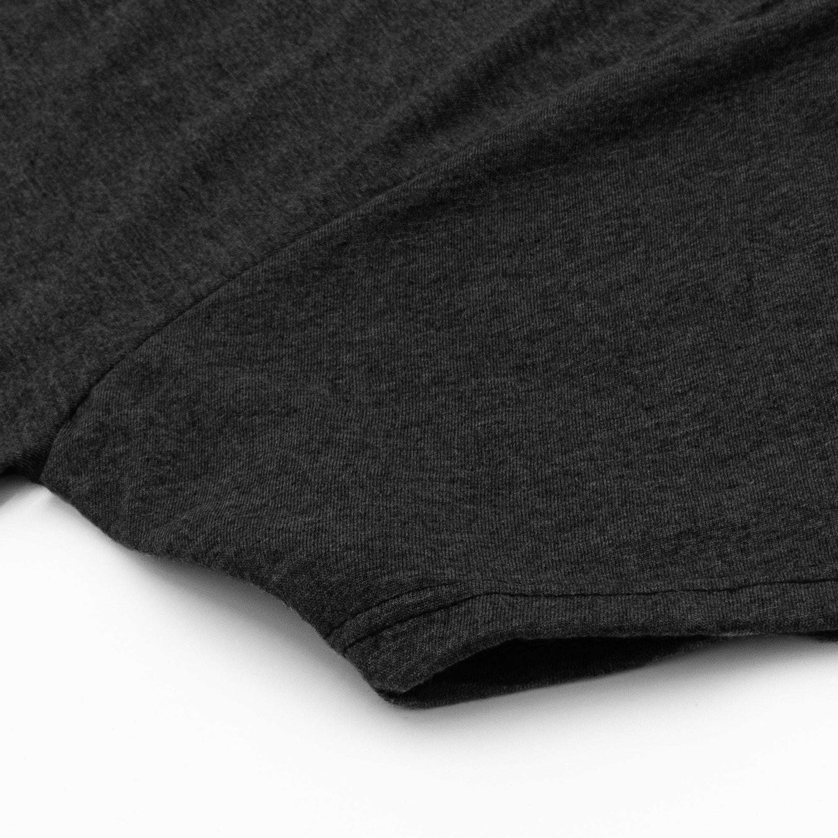 Heather charcoal T-shirt sleeve and curved hem with double-stitched edge