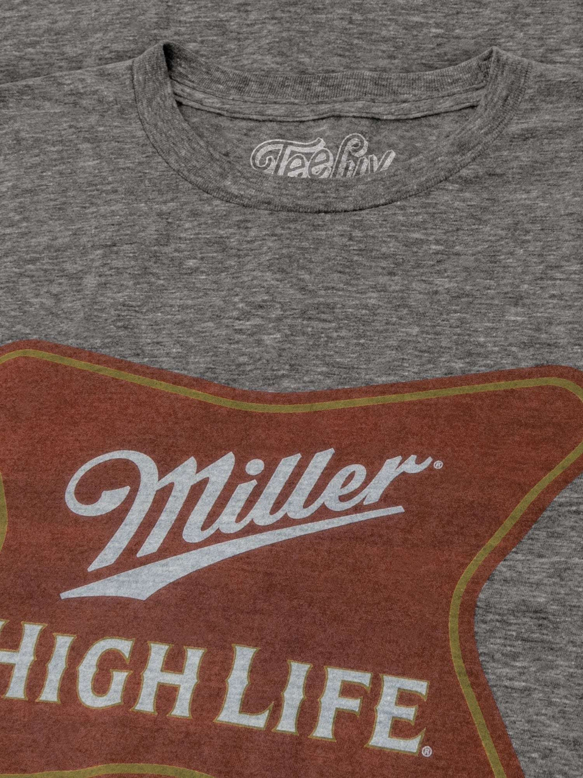 Graphite heather T-shirt neckline with TeeLuv logo and partial Miller High Life graphic