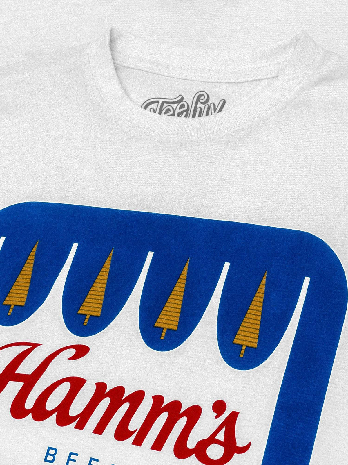 White T-shirt close-up of front Hamm's Beer logo graphic with beer bottle icons