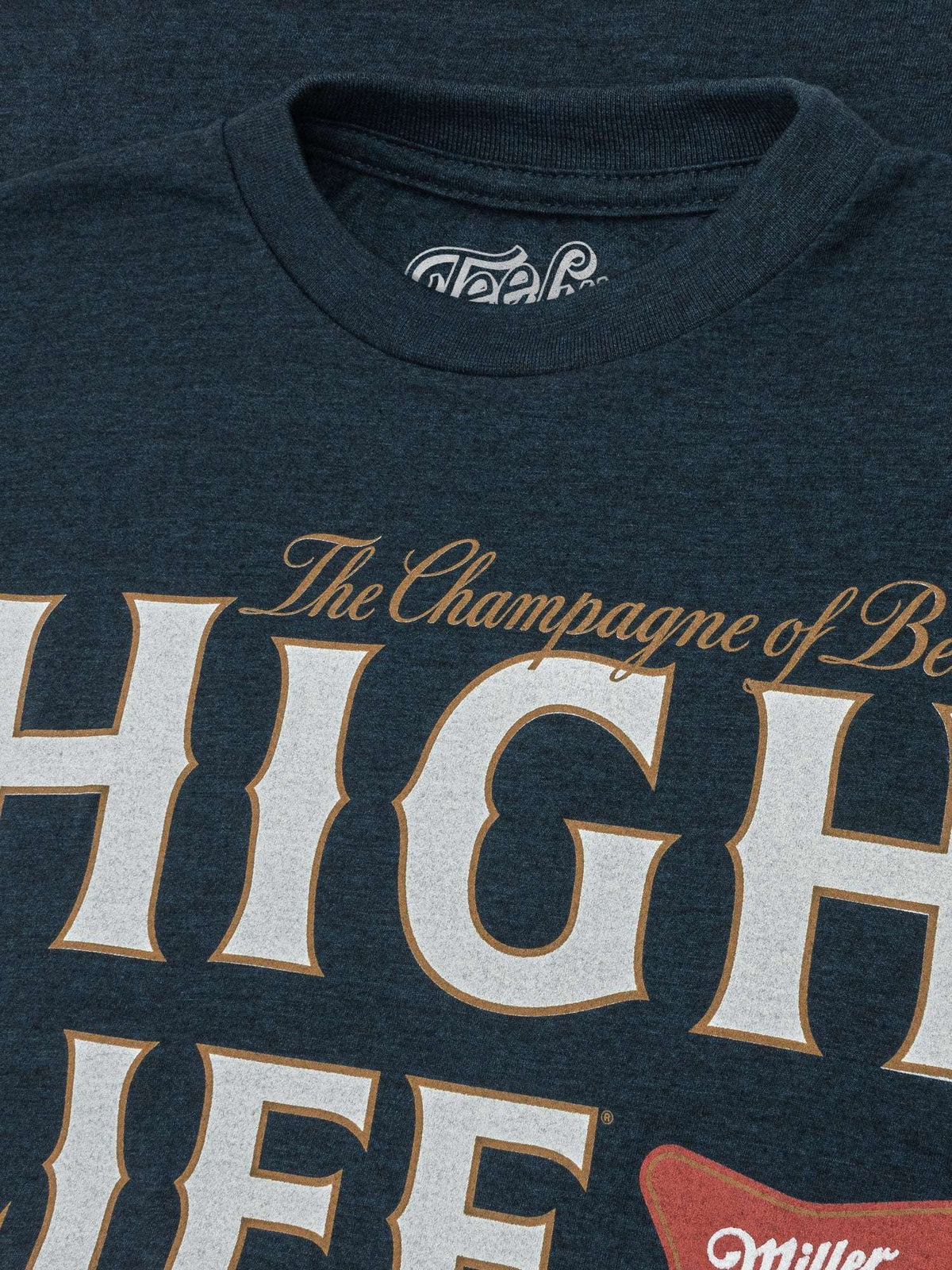 Heather navy T-shirt with “High Life” logo and Miller High Life emblem detail