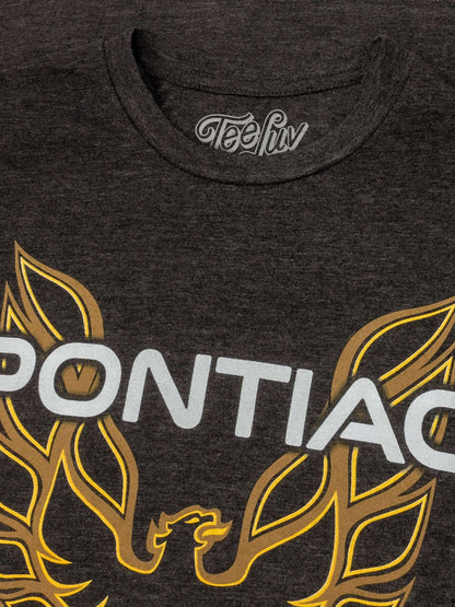 Dark heather gray T-shirt close-up of Pontiac text with yellow flame wing graphics