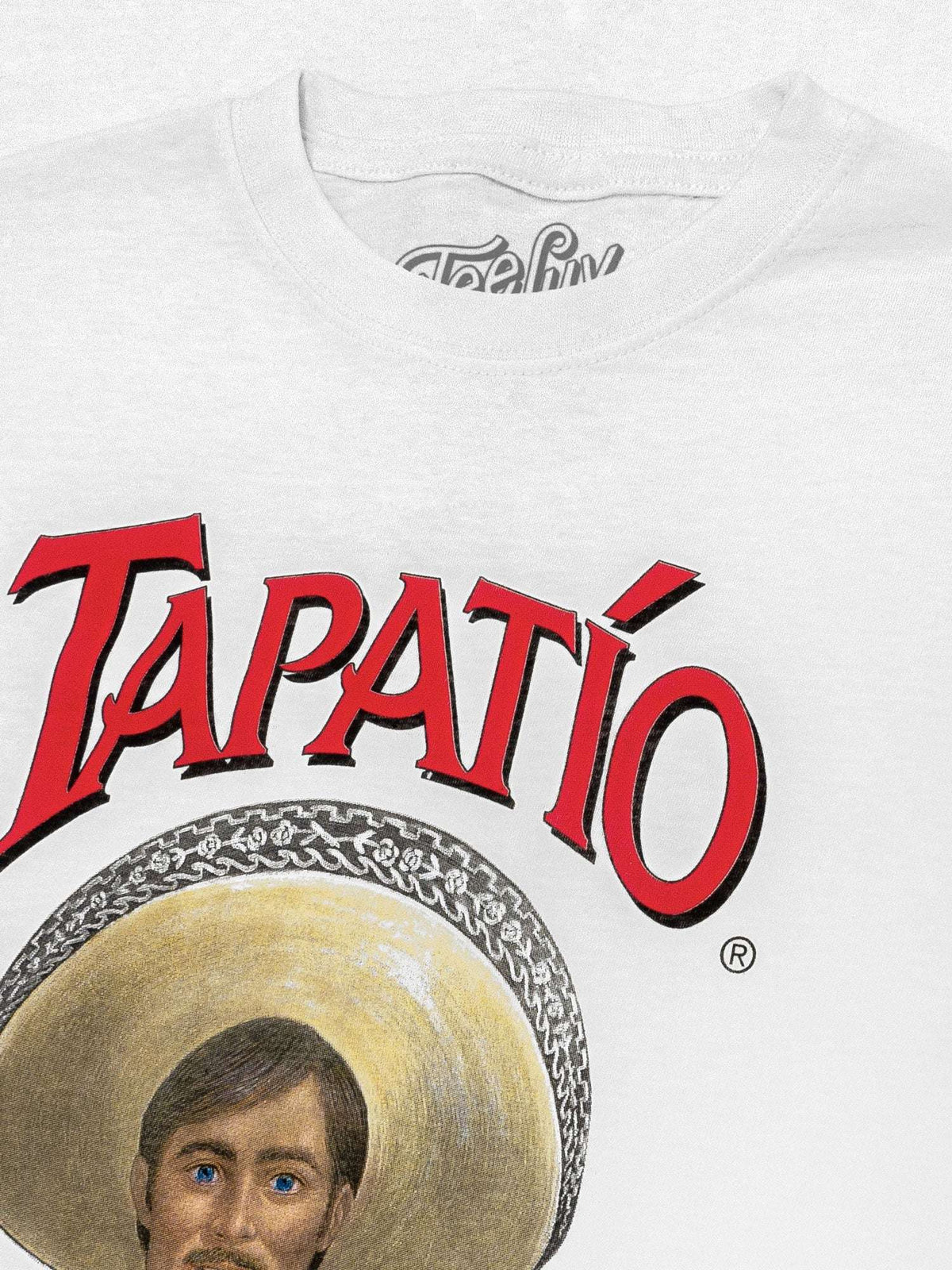 Tapatío logo white T-shirt with red lettering and face graphic