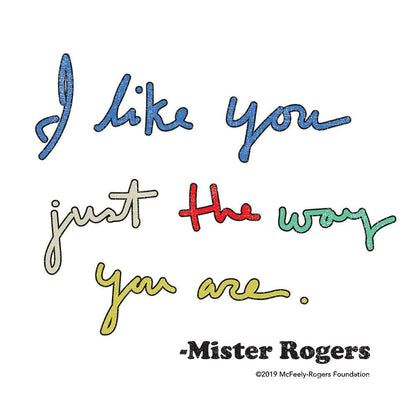 Close-up of “I like you just the way you are” quote print on white T-shirt