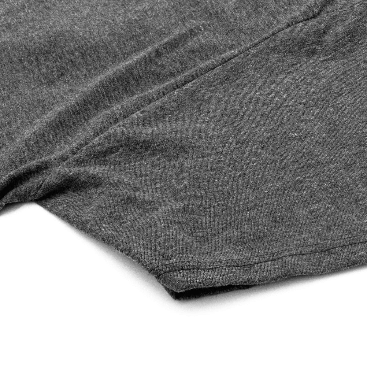 Gray t-shirt with stitched side seam and curved hem