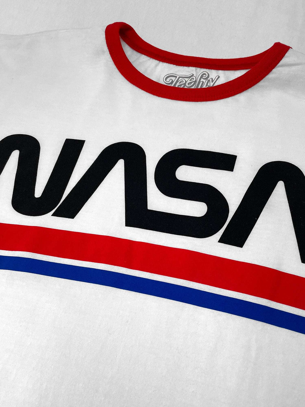 White ringer T-shirt close-up with red collar and large NASA Worm graphic