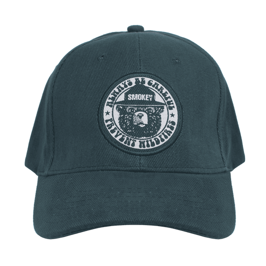 Forest green baseball cap with circular Smokey Bear 'Prevent Wildfires' embroidered logo