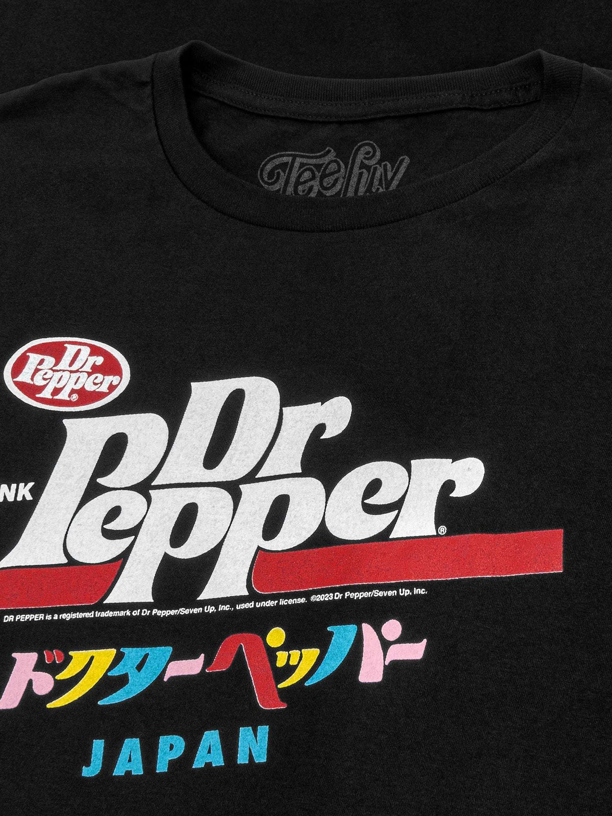 Black cotton T-shirt front design close-up with Dr Pepper Japan logo
