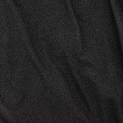 Black t-shirt fabric close-up showing smooth knit texture