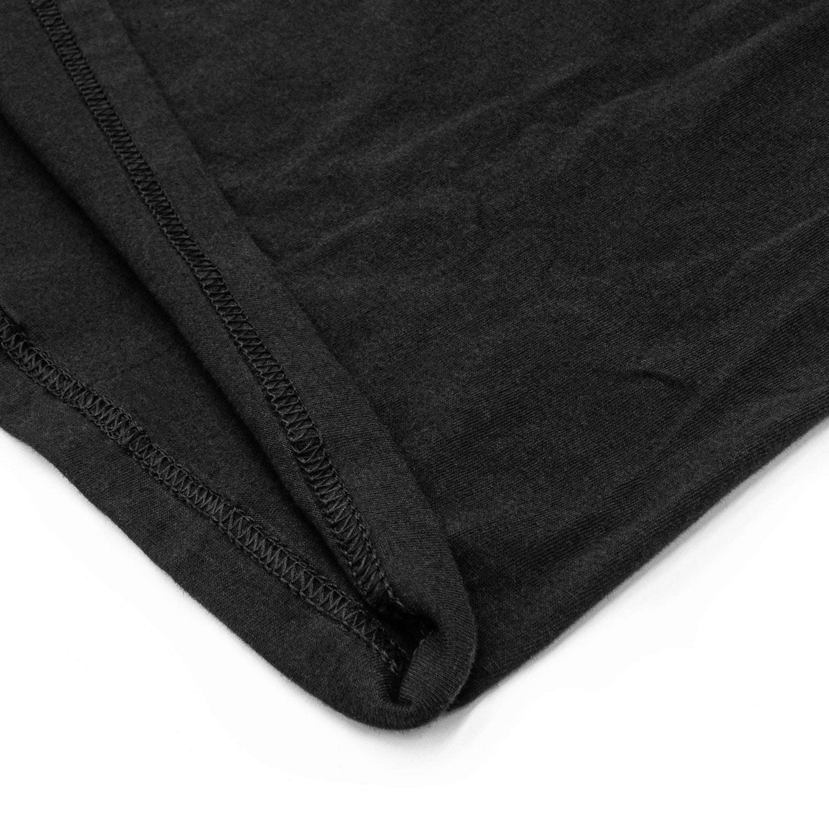 Black t-shirt bottom hem with double-stitched finish
