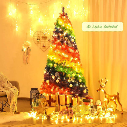 Rainbow artificial Christmas tree decorated with ornaments and lights