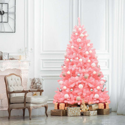 Decorated pink artificial Christmas tree with white and silver ornaments