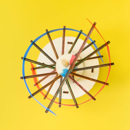 Top view of wooden DNA double helix model with colorful curved slats