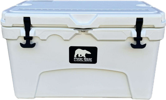 White hard cooler with black latch handles and Polar Bear logo badge on front.