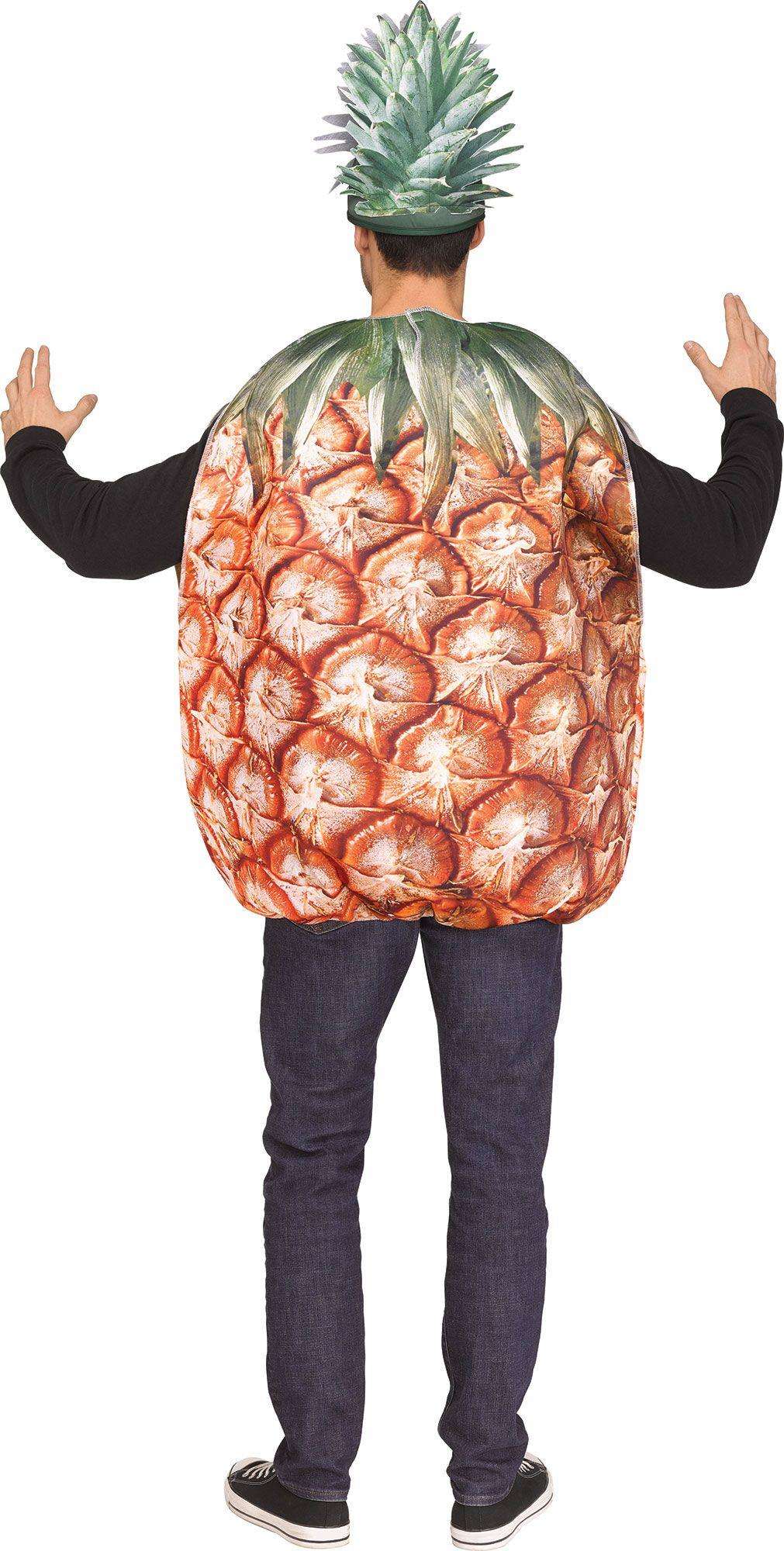 Back view of orange pineapple-print tunic and spiky green leaf hat over black pants