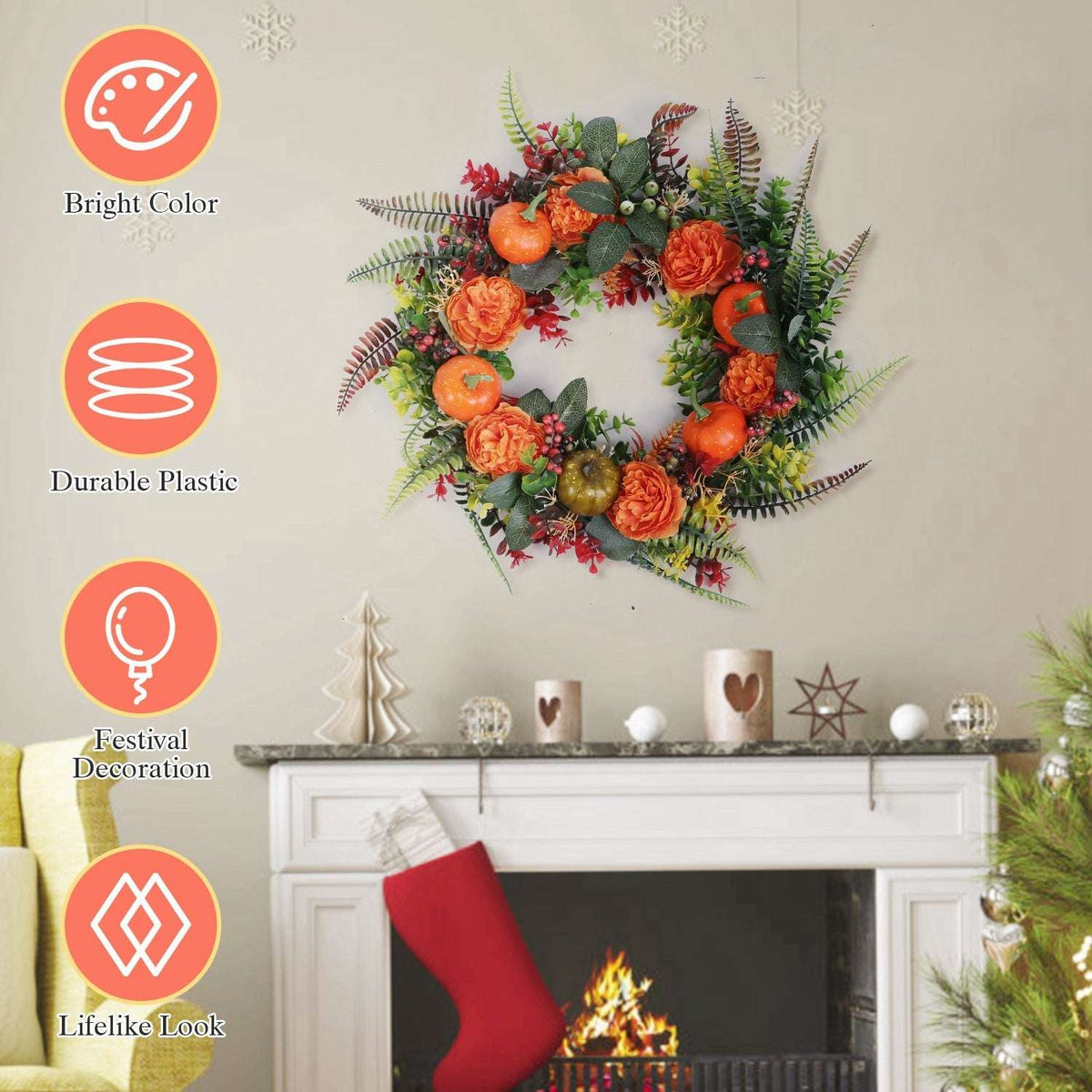 Decorative autumn wreath with orange faux pumpkins, orange flowers, and leafy greenery