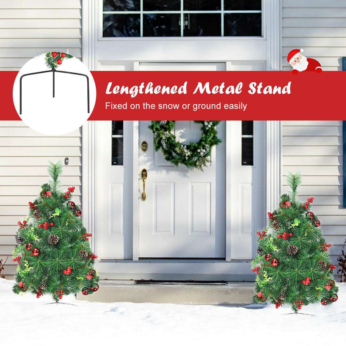 Pair of decorated Christmas trees with metal stands, shown flanking an entrance