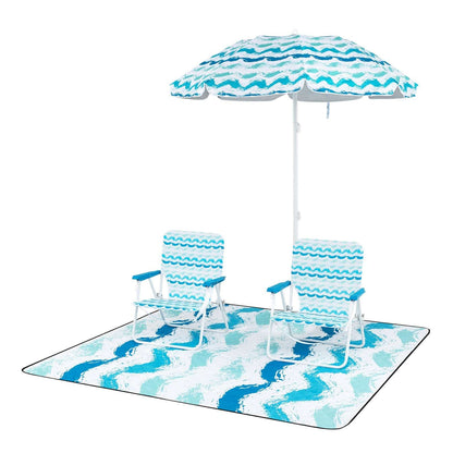 Blue beach umbrella set with two foldable chairs and patterned picnic blanket