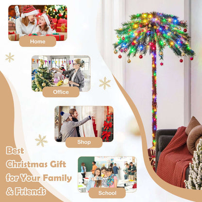 Palm Christmas tree decorated with multicolor lights and hanging ornaments