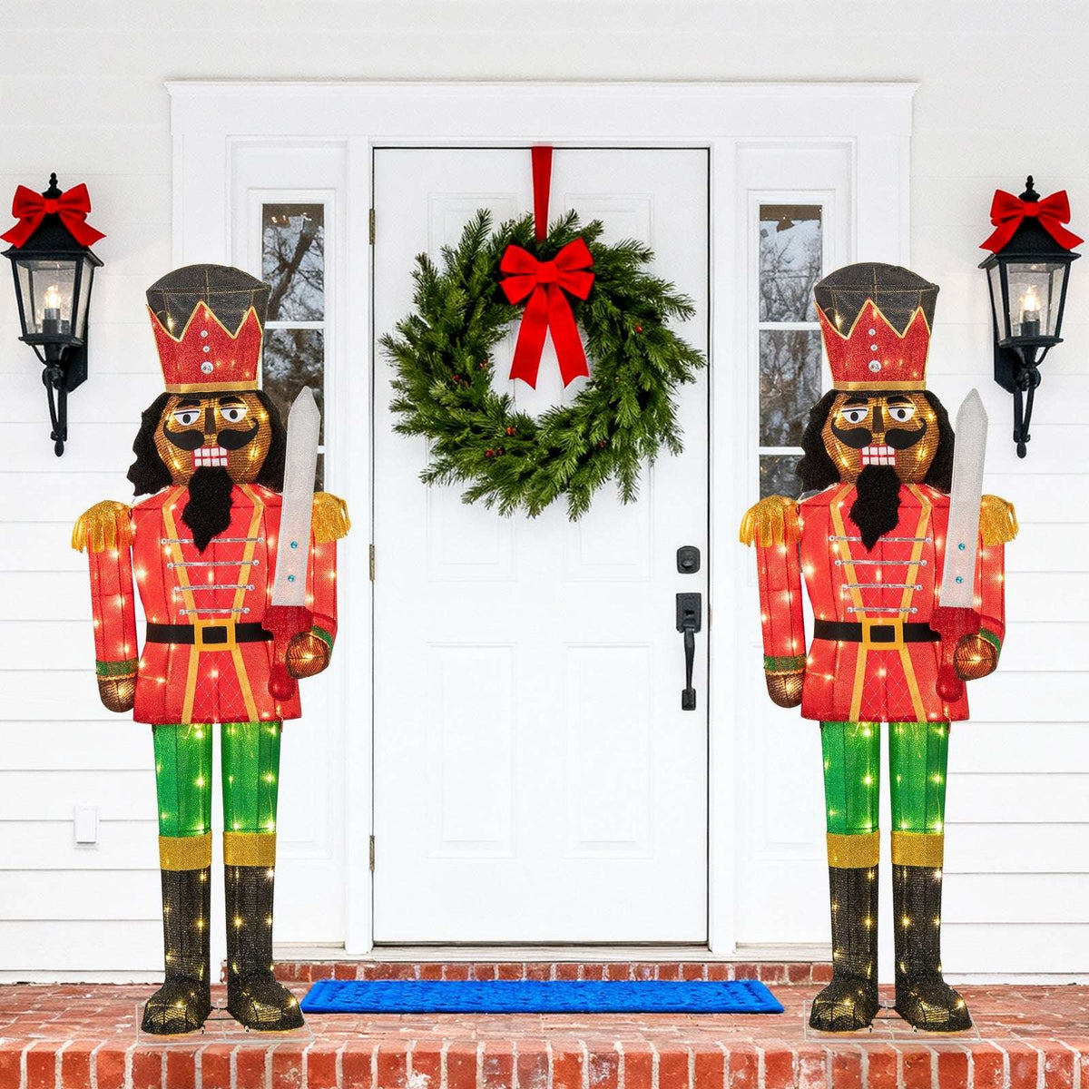 Lighted Christmas nutcracker with glitter sword displayed beside a front door