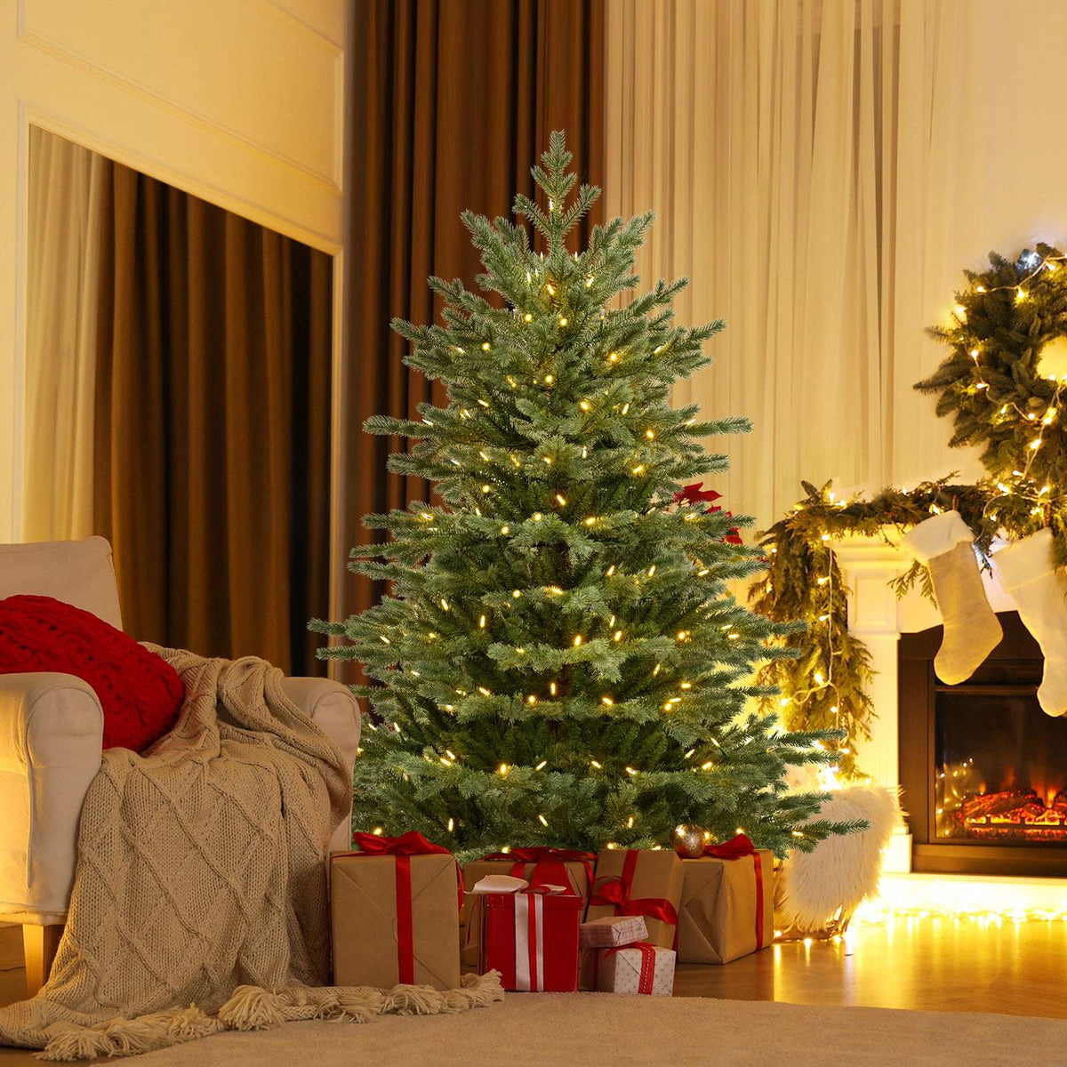 Artificial Christmas tree with warm white lights and a broad, full profile