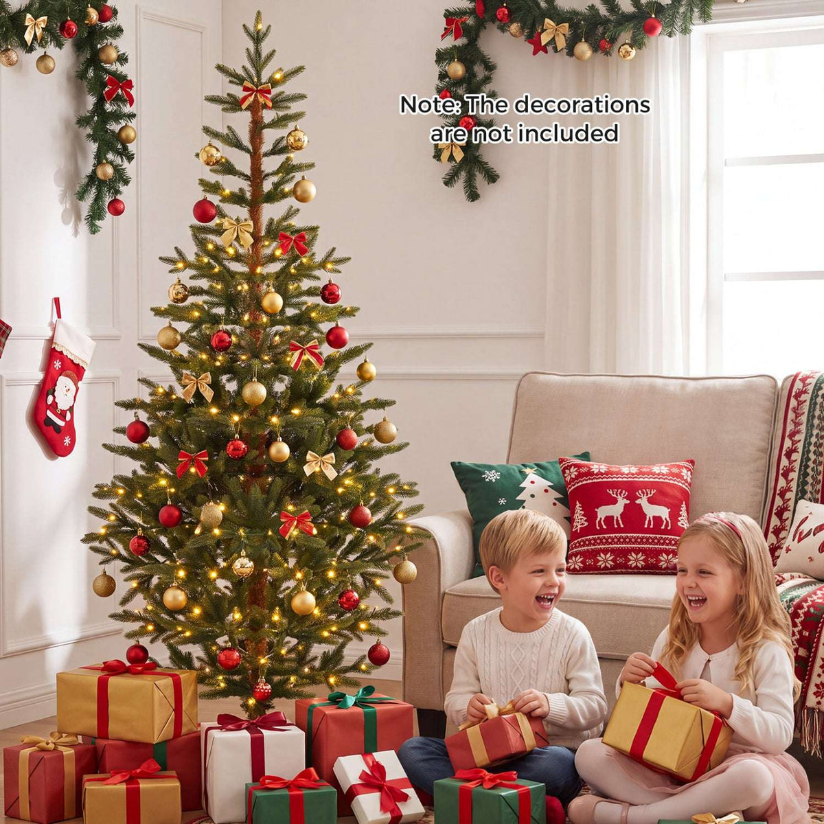 Decorated artificial Christmas tree with warm lights, red and gold ornaments, and gifts