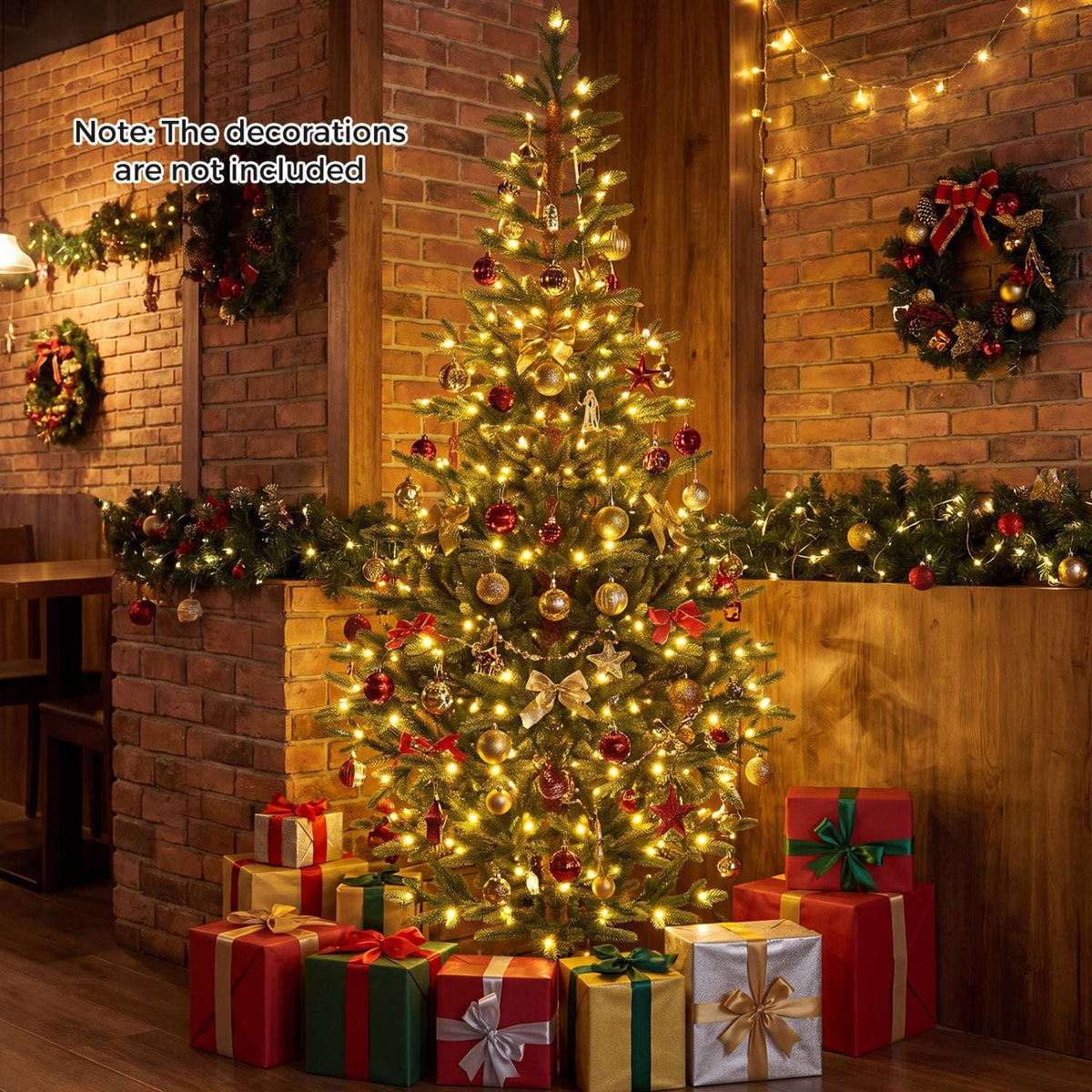 Artificial Christmas tree with warm LED lights, red and gold ornaments, and gifts