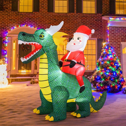 Inflatable green dinosaur carrying a red-suited Santa, with LED lights
