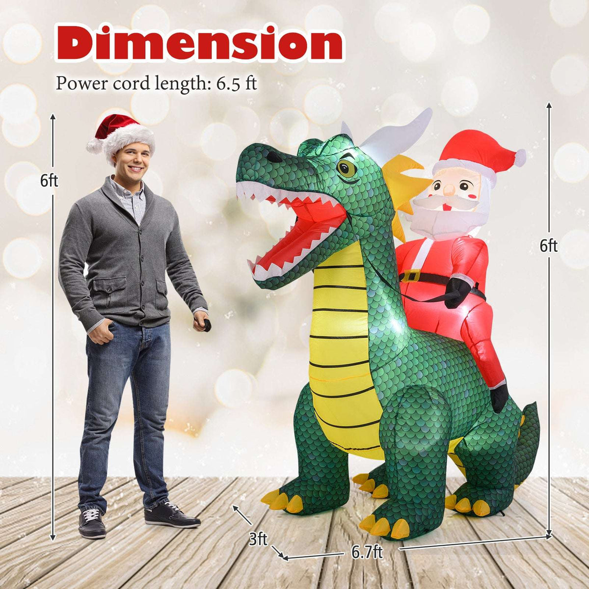 Inflatable Santa riding a green dinosaur, shown beside a person for scale