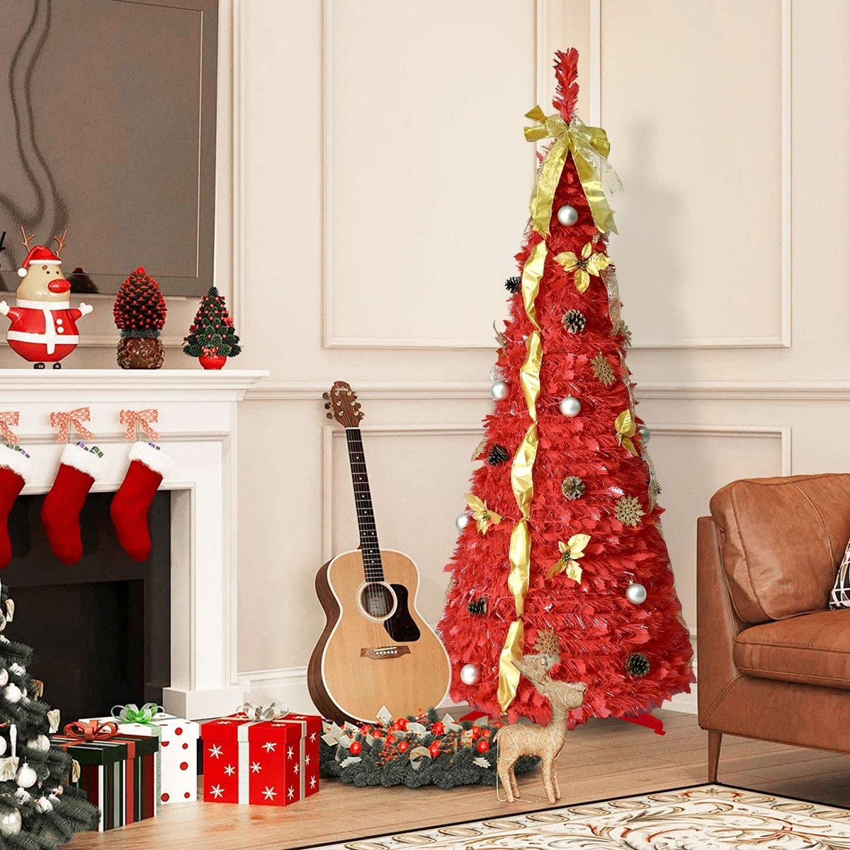Red Christmas tree with warm LED lights, gold ribbon, baubles and pine cones