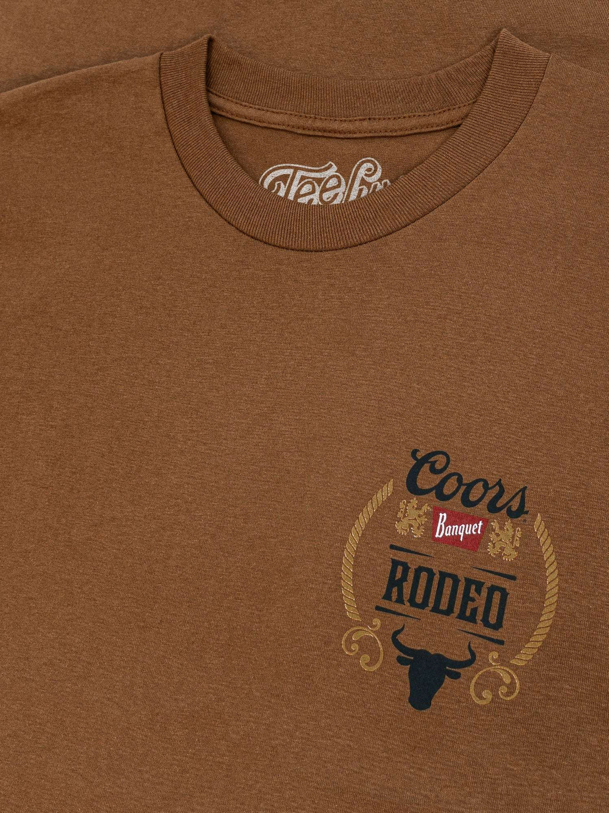 Brown cotton T-shirt, TeeLuv neck label and small Coors Rodeo emblem.