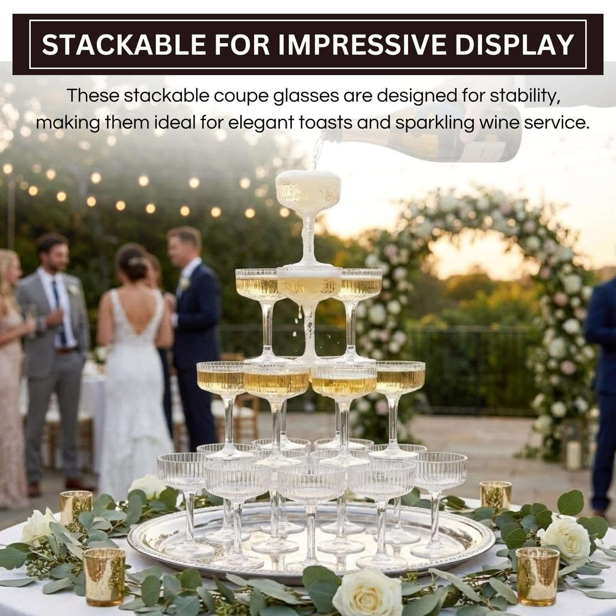 Outdoor event champagne tower made of stackable clear acrylic coupe glasses with gold drink