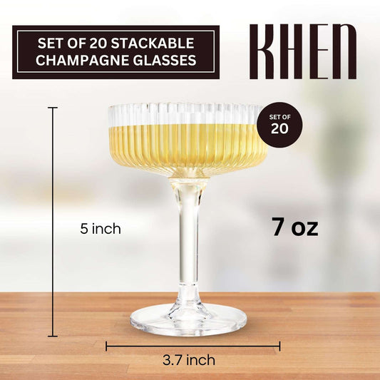 Clear acrylic champagne coupe glass with gold drink, fluted bowl and round base