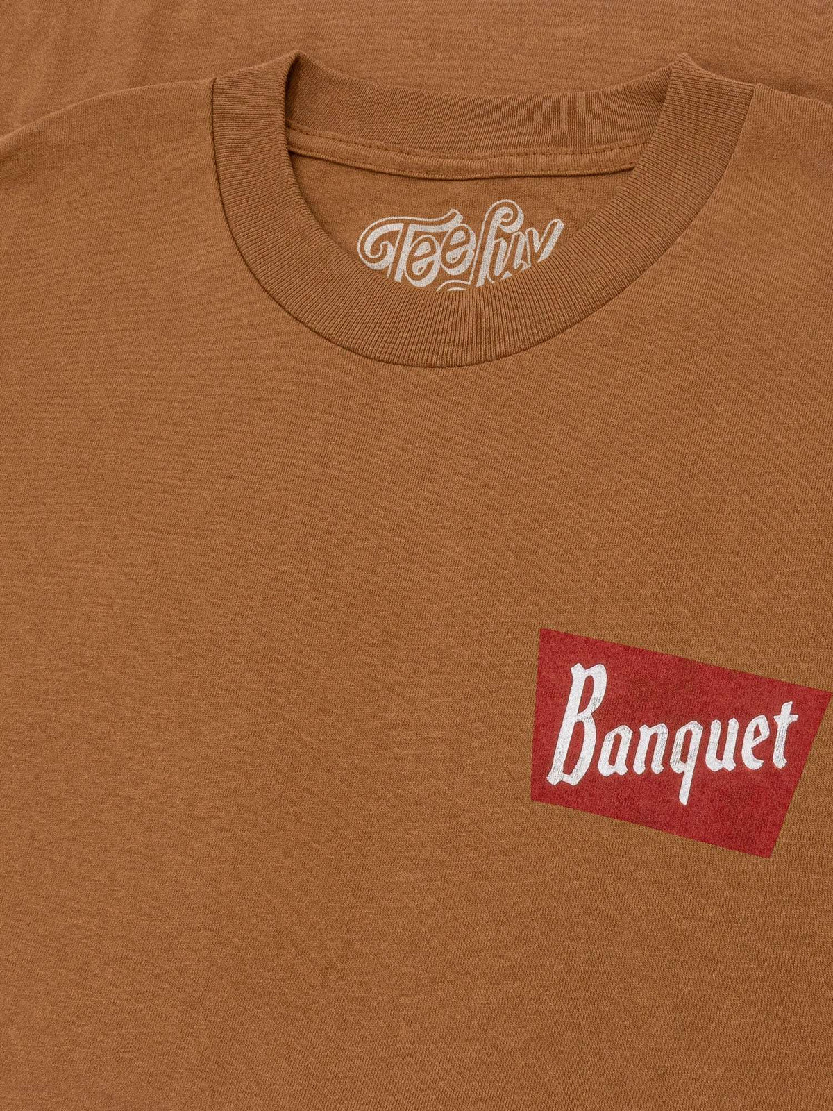 Brown T-shirt neckline with Tee Luv logo and Banquet chest patch