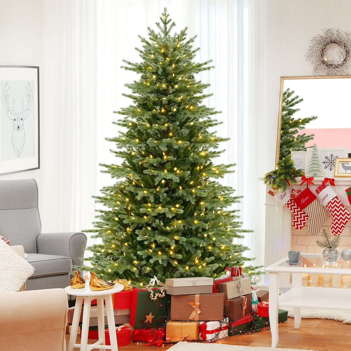 Full artificial Christmas tree glowing with warm white LED lights